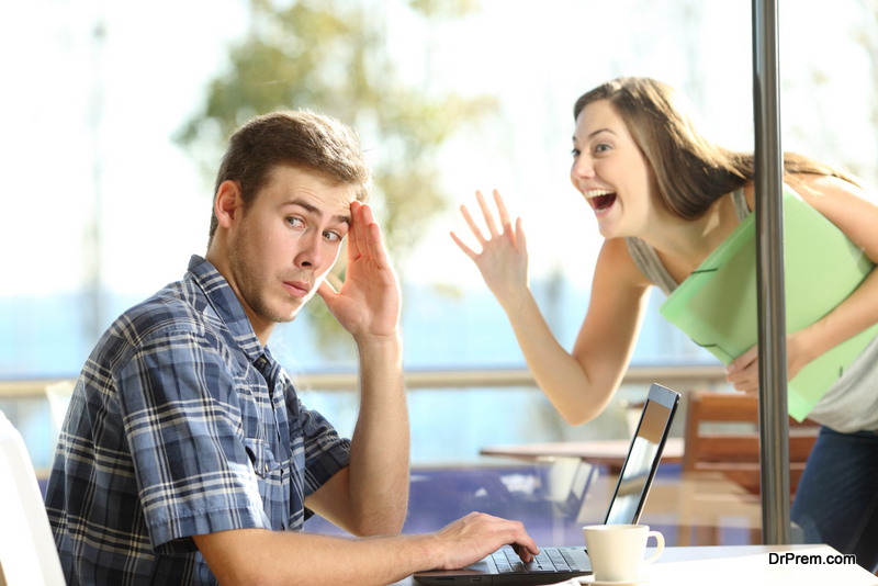 woman-distracting-her-partner-in-the-office