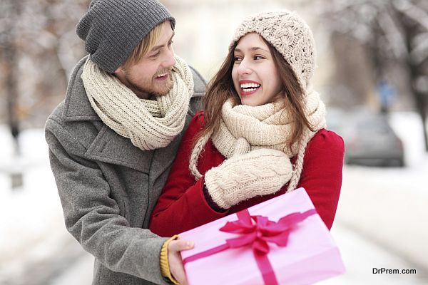 Man giving woman a surprise gift