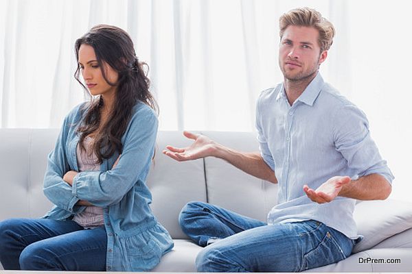 Woman with arms crossed back to her partner