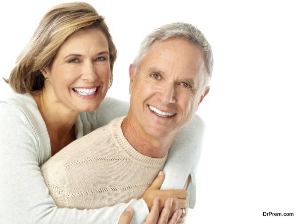 Happy elderly couple in love. Isolated over white background