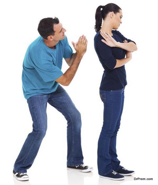 man begging his angry wife