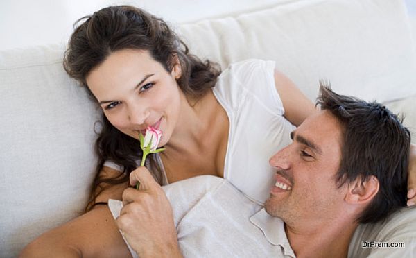 Couple relaxing together with flower
