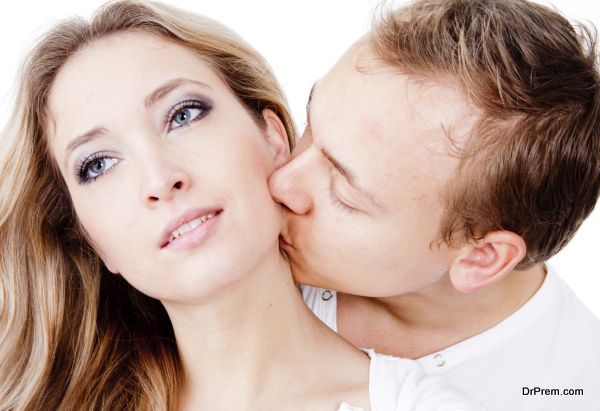 Man kissing girlfriend