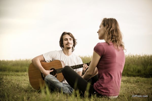 Playing guitar - dating couple